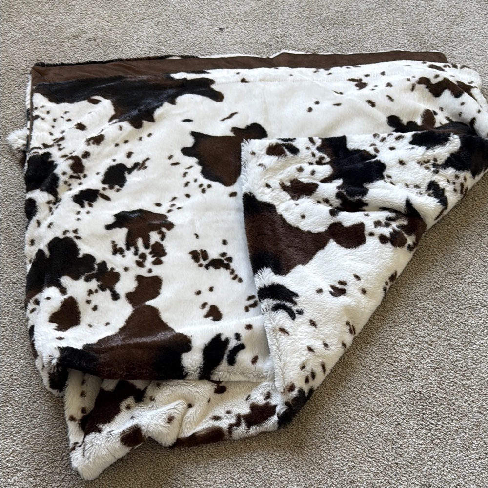 Cowhide throw-blanket